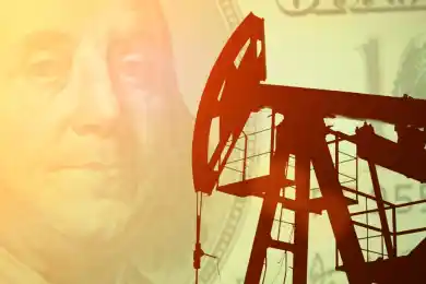 Досаев: "На курс тенге давил рынок нефти"