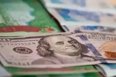 Курс доллара на утренних торгах составил 418,9 тенге