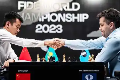 Ян сыграл вничью с Дином, но остался лидером