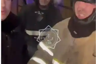 В Астане пожарный спас младенца в горевшем ЖК